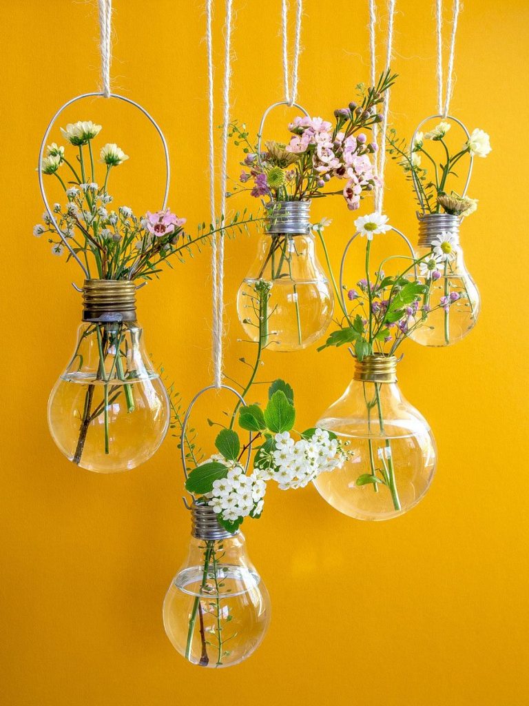 Light bulbs hung on rope as unique bud vases